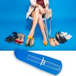 woman posing with stylish footwear summer fashion and bag, long legs, shopping